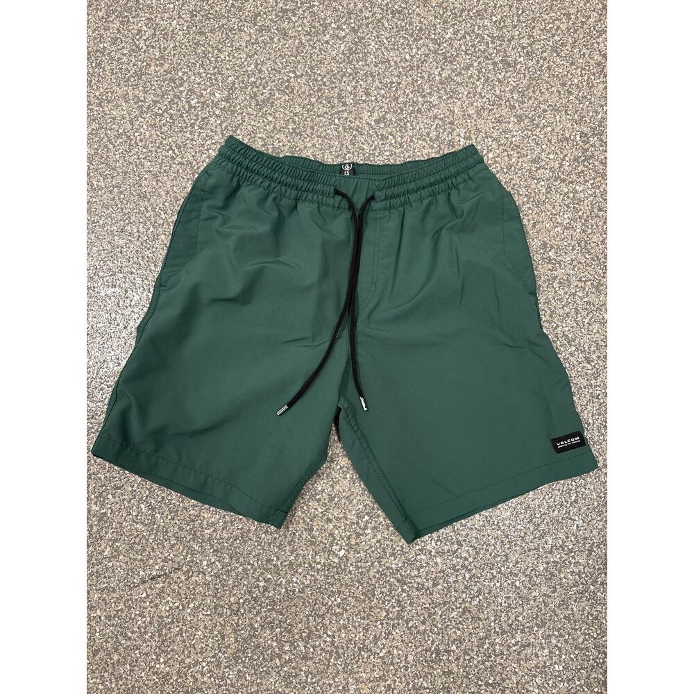 Green Volcom board shorts